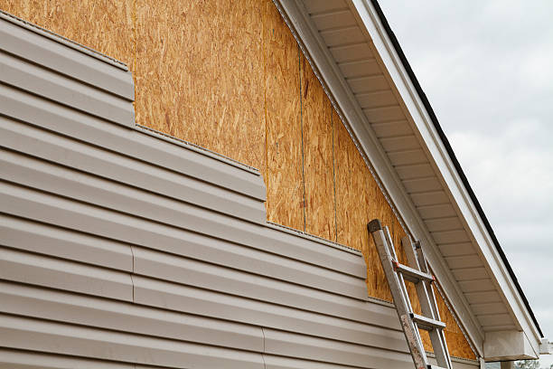 Professional Siding Replacement technician working in New Paris, OH